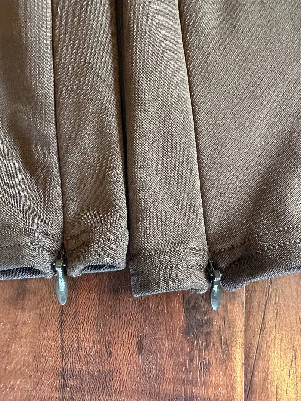 ALO Yoga Women’s Flared Leggings in Dark Olive
